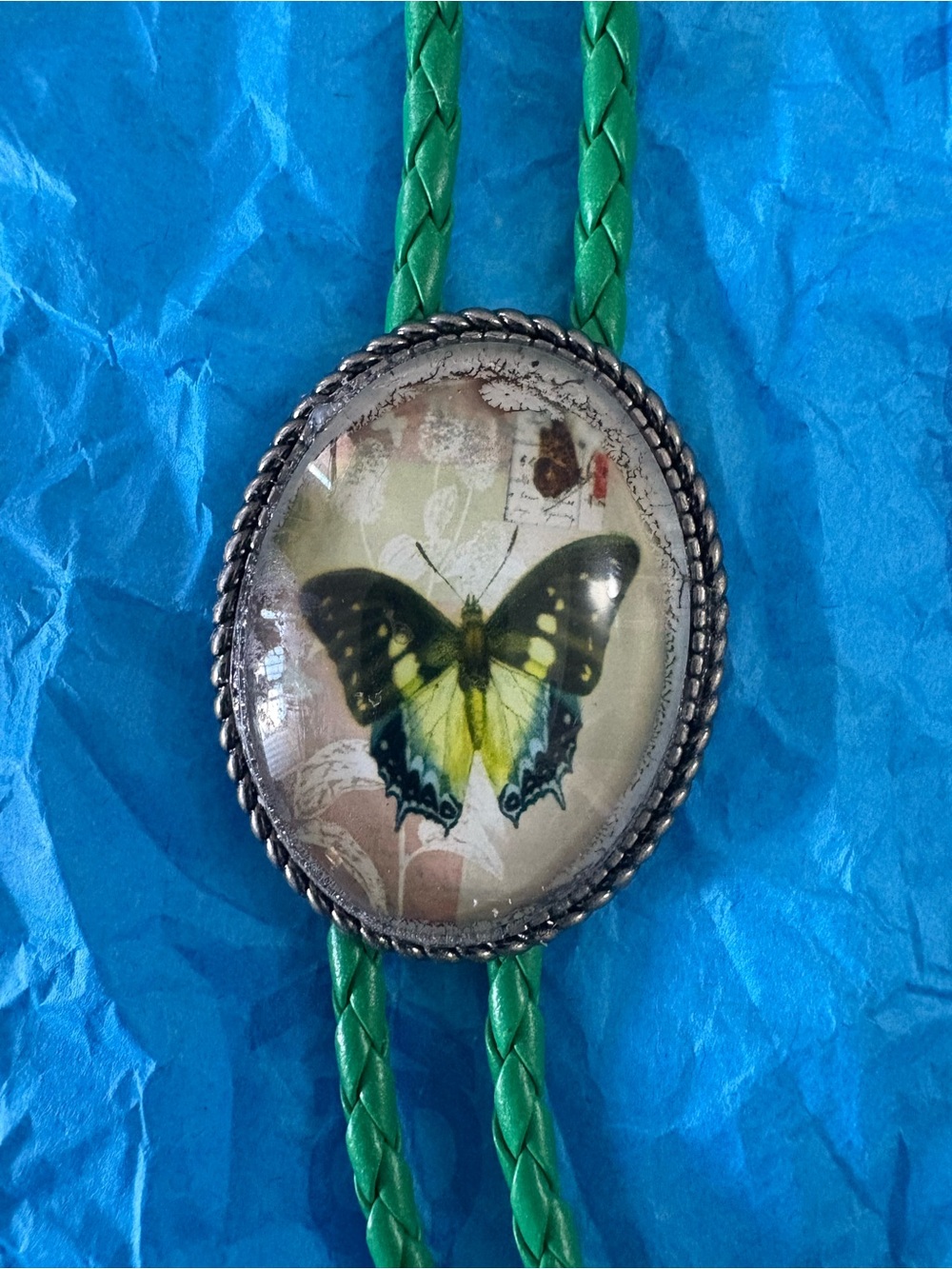 Butterfly Glass Cabochon Bolo Tie - Green Cord